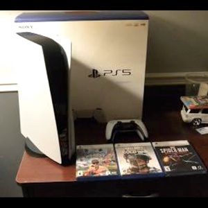 PlayStation 5 plus games ( spider man + 2 extra)